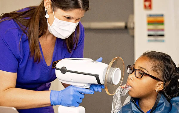 Dental school county-based oral health care.